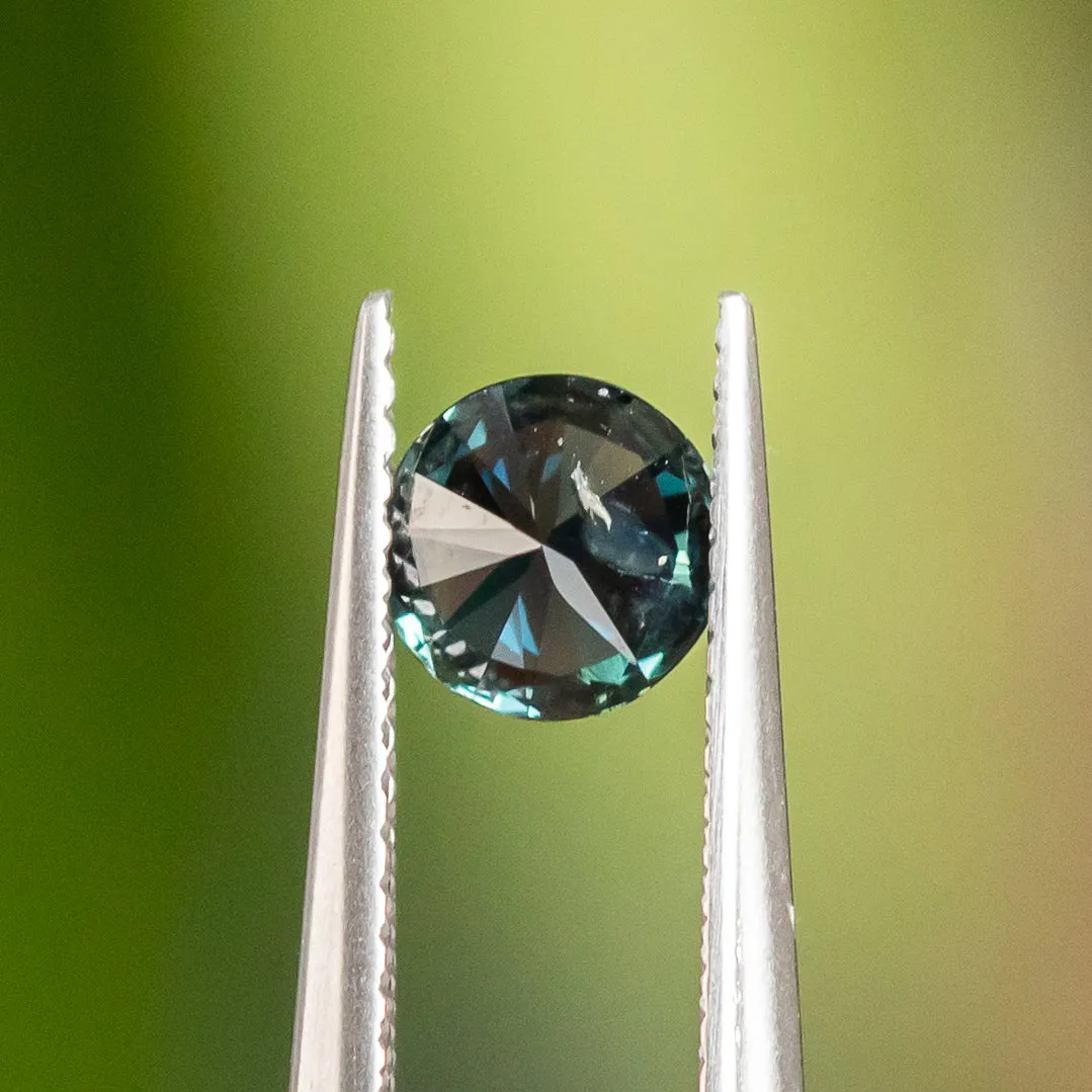 0.92CT ROUND NIGERIAN SAPPHIRE, TEAL, 5.95X5.85X3.44MM, UNTREATED