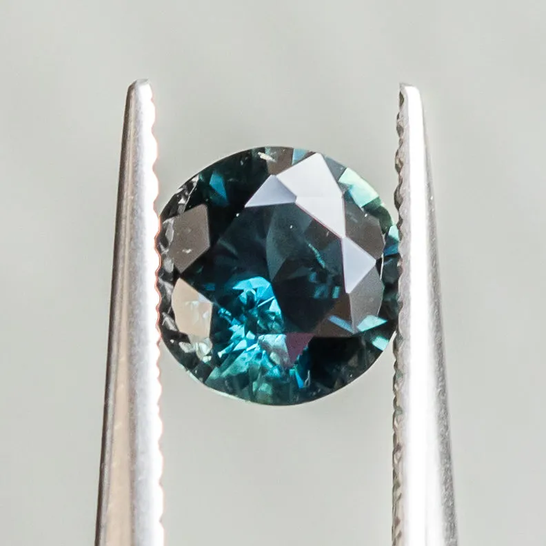 0.92CT ROUND NIGERIAN SAPPHIRE, TEAL, 5.95X5.85X3.44MM, UNTREATED