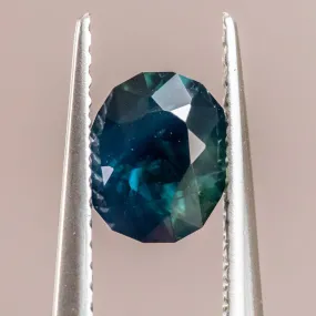 1.25CT OVAL NIGERIAN SAPPHIRE, DEEP BLUE GREEN, 7.13X6.09X3.81MM, UNTREATED